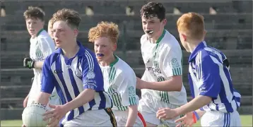  ??  ?? Centre-back Danny Glennon making a determined run for Good Counsel.