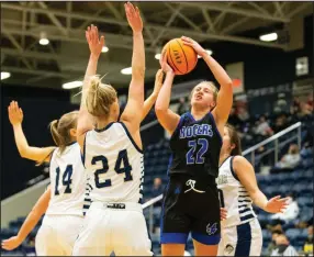  ?? (Special to the NWA Democrat-Gazette/David Beach) ?? Kate Miller (right) scored 21 points to lead Rogers to a 51-37 victory over Bentonvill­e West on Tuesday night in Centerton. Miller had 12 of her 21 points in the second quarter.