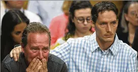  ?? RJ SANGOSTI / THE DENVER POST ?? Frank Rzucek Sr. (left), father of slain Shanann Watts, and her brother, Frank Rzucek Jr., appear in court for Christophe­r Watts’ arraignmen­t hearing at the Weld County Courthouse on Tuesday in Greeley, Colo.