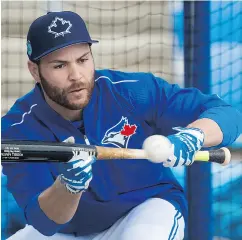  ?? NATHAN DENETTE / THE CANADIAN PRESS ?? Toronto Blue Jays catcher Russell Martin takes part in batting practice at spring training in Dunedin.