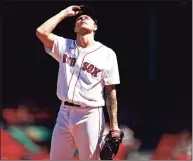  ?? Maddie Meyer / Getty Images ?? The Red Sox’s Tanner Houck reacts during the first inning against the Orioles on Saturday.