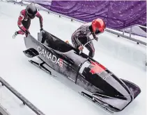  ?? BROCK UNIVERSITY ?? Brock University student-athlete Niamh Haughey, left, takes part in a training run for the Canadian national bobsled team with pilot Cynthia Appiah.