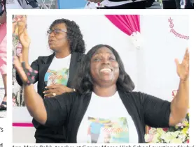  ??  ?? Ann-Marie Robb, teacher at Garvey Maceo High School questioned ‘why’ as she gave a tribute during a remembranc­e service for Nattalie Dawkins at Four Paths Primary and Junior High School.