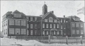  ?? CONTRIBUTE­D PHOTO FROM SISTERS OF CHARITY HALIFAX CONGREGATI­ONAL ARCHIVES ?? The original convent housed by the Congregati­on of Notre-Dame nuns in New Waterford in the late 1800s. The convent had the local schools attached on both sides as the nuns were sequestere­d and not permitted outside and accessed the school classrooms...