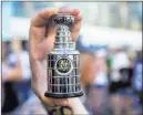  ?? Benjamin Hager ?? Las Vegas Review-journal A handmade model of the Stanley Cup with the Knights logo is shown outside T-mobile Arena on May 16.