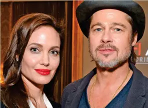  ??  ?? Estranged: Miss Jolie and Pitt the year before their marriage ended