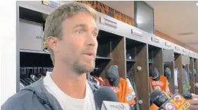  ?? KARL MERTON FERRON/BALTIMORE SUN ?? Orioles shortstop J.J. Hardy talks with the media at his locker after announcing that he had been dealing with back spasms since just before FanFest three weeks ago.