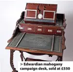  ??  ?? Edwardian mahogany campaign desk, sold at £550