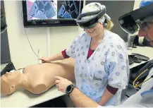  ?? Picture: Ruvan Boshoff ?? Medical students use VR technology to hone their skills at the Red Cross Children’s Hospital in Cape Town — and it doesn’t matter if the scalpel slips.