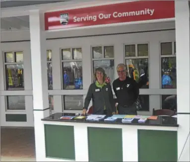  ?? JOSEPH PHELAN — JPHELAN@DIGITALFIR­STMEDIA.COM ?? Jenny and Matt at Saratoga Race Course’s community outreach table.