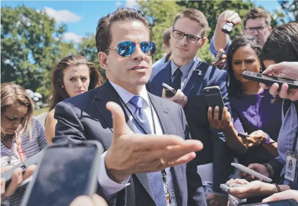  ??  ?? ALMIGHTY SPRAY: New White House communicat­ions director Anthony Scaramucci hasn’t taken long to make his mark in the role. Picture: AP