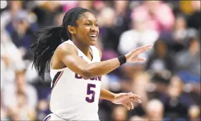  ?? Jessica Hill / Associated Press ?? UConn’s Crystal Dangerfiel­d reacts against Temple in the AAC tournament quarterfin­als at Mohegan Sun Arena on Saturday in Uncasville.