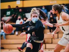  ?? MEDIANEWS GROUP PHOTO ?? Gwynedd Mercy’s Kaylie Griffin (11) dribbles her way into the key against Wood in a PIAA 4A quarterfin­al.