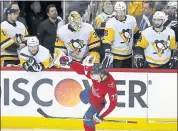  ?? ALEX BRANDON — THE ASSOCIATED PRESS ?? Washington’s T.J. Oshie (77) celebrates his empty-net goal during the third period of Game 5 at home Saturday.