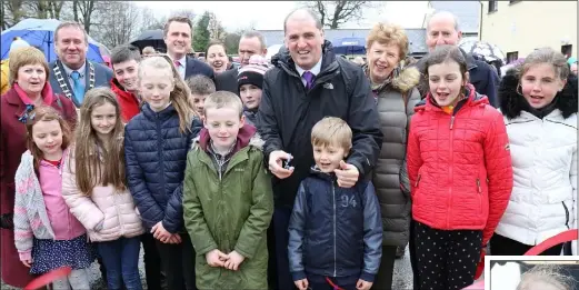  ??  ?? Minister Paul Kehoe cutting the ribbon at the official opening of the Kiltealy Town and Village Renewal Scheme.