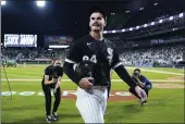  ?? NAM Y. HUH — THE ASSOCIATED PRESS ?? Chicago White Sox starting pitcher Dylan Cease looks to fans as he leaves the field after the White Sox defeated the Minnesota Twins in Chicago on Saturday.