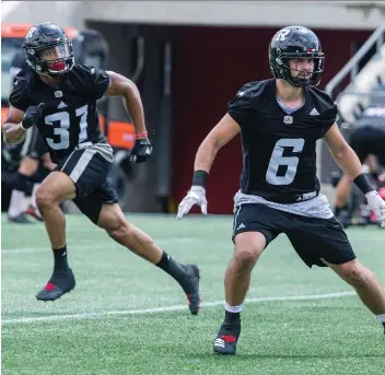  ?? ERROL MCGIHON ?? Defensive back Antoine Pruneau, right, is one of five original Ottawa Redblacks with a chance to qualify for a third Grey Cup game since the franchise entered the CFL in the 2014 season.