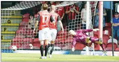  ??  ?? NO CHANCE: Kayden Jackson hits Grimsby’s first goal