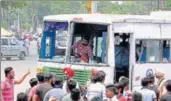  ??  ?? A bus damaged by protesters over murder of Paras (below), near Fountain Chowk in Patiala on Saturday. BHARAT BHUSHAN/HT