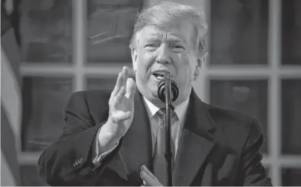  ?? EVAN VUCCIV
AP ?? U.S. President Donald Trump speaks during an event in the Rose Garden at the White House to declare a national emergency in order to build a wall along the southern border, on Friday in Washington. •