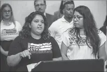  ?? L.E. BASKOW ?? Alicia Contreras and Erika Castro lead community organizati­ons, activists and representa­tives on Tuesday at the East Las Vegas Community Center to discuss the future for the 13,000 Nevada participan­ts in the Deferred Action for Childhood Arrivals...