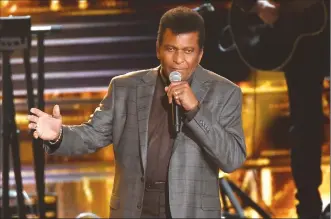 ?? Associated Press photo ?? In this Nov. 2, 2016 file photo, Charley Pride performs “Kiss An Angel Good Morning” at the 50th annual CMA Awards at the Bridgeston­e Arena in Nashville, Tenn. Pride finds himself in the spotlight with two PBS projects.