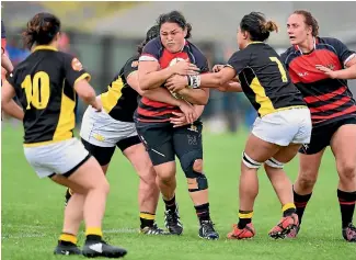  ?? PHOTO: GETTY IMAGES ?? Canterbury captain Stephanie Te O’haere-Fox takes the ball up against Wellington at Linfield Park on Saturday.