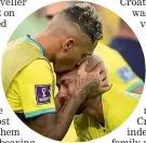  ?? AP ?? A tearful Neymar is embraced by team-mate Raphinha.