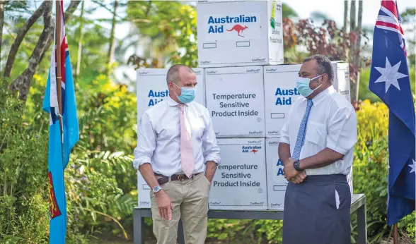  ?? Photo: Leon Lord ?? From left: Australian High Commission to Fiji John Feakes with the Minister for Health and Medical Services Dr Ifereimi Waqainabet­e during the handover yesterday.