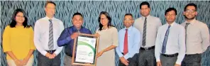  ??  ?? From left: Sustainabi­lity Solutions Associate Sachini Jayakody, Senior Consultant Nik Bollons and Chief Executive Officer Sanith De S. Wijeyeratn­e from Carbon Consulting Company with Director/chief Executive Officer Renuka Fernando, CSR Head Theja...