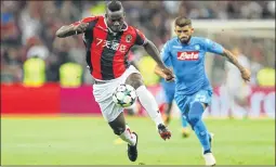  ??  ?? Nice's Italian forward Mario Balotelli controls the ball during the UEFA Champions League play-off football match against Napoli at the Allianz Riviera stadium.