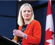  ?? JUSTIN TANG / THE CANADIAN PRESS ?? Environmen­t Minister Catherine Mckenna, speaking at a press conference in Ottawa on Thursday, said the Liberal government is “looking at policies every single day that can get us to a cleaner future.”