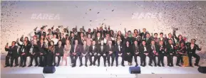  ??  ?? PHOTO shows the winners of the Asia Responsibl­e Entreprene­urship Awards (AREA) 2017.