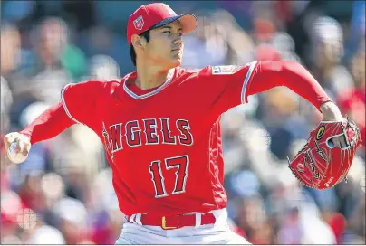  ?? AP PHOTO ?? In this Feb. 24 file photo, Los Angeles Angels’ Shohei Ohtani works against the Milwaukee Brewers during the first inning of a spring training baseball game in Tempe, Ariz.