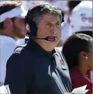  ?? (AP file photo) ?? Mike Leach begins his tenure as coach at Mississipp­i State on the road against defending national champion LSU on Saturday. In his first visit to Tiger Stadium as Kentucky’s offensive coordinato­r in 1998, he left with an upset victory.