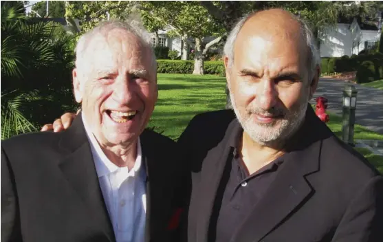  ?? HBO ?? “Blazing Saddles” and “Young Frankenste­in” filmmaker Mel Brooks (left) poses with his occasional interviewe­r and the director of “Unwrapped,” Alan Yentob.