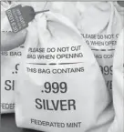  ??  ?? ■ SILVER HITS ROCK BOTTOM: Everyone’s scrambling to get the Silver Vault Bags each loaded with 10 solid .999 pure Silver State Bars before they are all gone. That’s because the standard State Minimum set by the private Federated Mint dropped 42%, going from $50 per bar to just $29, which is a real steal.