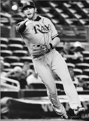  ?? Ray Stublebine, Reuters, file ?? Tampa Bay Rays third baseman Evan Longoria charges to throw out New York
Yankees batter Alex Rodriguez during September MLB action in New York.