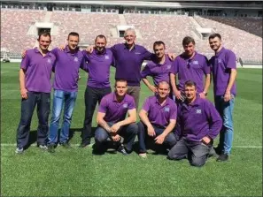  ??  ?? SIS Pitches founder George Mullan with members of his team at Luzhniki Stadium