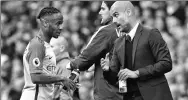  ?? REUTERS ?? Manager Pep Guardiola speaks to Raheem Sterling during Manchester City’s match against Sunderland on Aug 12.