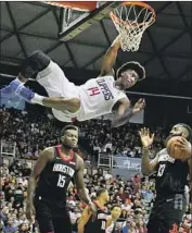  ?? Darryl Oumi Getty Images ?? AT 6 FEET 7, rookie Terance Mann can play close to the hoop but figures to develop into a point guard.