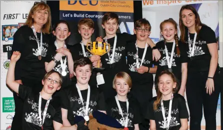  ??  ?? The Wicklow Montessori Primary School team who were crowned the 2019 Learnit &amp; DCU FIRST LEGO League Champions: (back, from left) School Principal Dara Mulhall, Eve Stokes, William O’ Riordain, James Dunne, Benjy Billington, Laura Hammond, school teacher Erica Gallagher, (front) Ciarán Walton, Matthew Leonard, JJ Bourke and Maya Hammond.