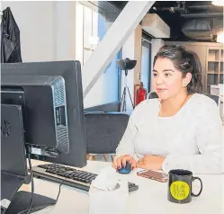  ??  ?? Organisati­ons like start-up accelerato­r Elevator – which opened its doors in Dundee in the autumn – are helping aspiring entreprene­urs achieve their business dreams. Picture shows Daniella Hernandez working on her business plan.