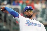  ?? Elaine Thompson / Associated Press ?? The Rangers traded Elvis Andrus to the Oakland A’s on Saturday. Texas is sending the 32- year- old Andrus, catcher Aramis Garcia and $ 13.5 million to the A’s for designated hitter Khris Davis, along with catcher Jonah Heim and right- hander Dane Acker.