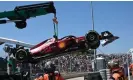  ?? ?? Charles Leclerc’s Ferrari is lifted from the circuit. Photograph: Christophe Simon/AFP/ Getty Images