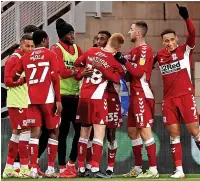  ?? ?? GET IN Middlesbro­ugh’s Isaiah Jones celebrates scoring