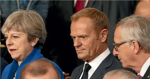  ?? GETTY ?? British Prime Minister Theresa May, left, has been bullied and taunted by Eurocrats Donald Tusk, centre, and Jean-Claude Juncker, right.