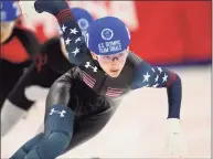  ?? Rick Bowmer / Associated Press ?? Kristen Santos competes in the 500-meter quarterfin­als during the U.S. Olympic short track speedskati­ng trials on Sunday, Dec. 19 in Kearns, Utah.