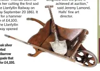  ??  ?? The oak silver mounted wheelbarro­w and spade that sold for £4,100.