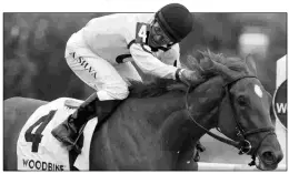  ?? MICHAEL BURNS ?? Dixie Moon, under jockey Eurico Da Silva, got an 88 Beyer Speed Figure for her Woodbine Oaks triumph on Saturday.